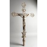 A LARGE PLATED CRUCIFIX. 33ins long.