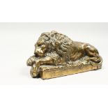 A VERY GOOD BRONZE OF A LION on a rectangular base. 7.5ins long.