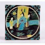 A GOOD ORIENTAL SQUARE TILE, enamel colours with figures. 7.5ins.