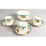 THREE MINTON CUPS AND SAUCER AND A MATCHING BOWL painted with landscapes in rectangular panels