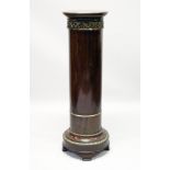 A MAHOGANY AND ORMOLU MOUNTED CIRCULAR COLUMN, EARLY/MID 20TH CENTURY, with a rotating top