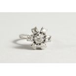 A SUPERB 18CT WHITE GOLD, DIAMOND FLOWER HEAD CLUSTER RING, a central diamond surrounded by six