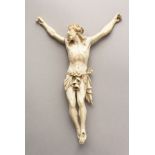 A SMALL 18TH CENTURY ITALIAN CARVED IVORY CORPUS CHRISTI. 6.5ins long.