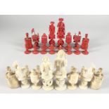 A GOOD MIXED SET OF CHINESE AND ENGLISH CARVED AND STAINED IVORY/BONE CHESS PIECES. (32)