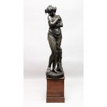 AFTER HOUDON (1741-1828) FRENCH A VERY LARGE BRONZE OF A STANDING FEMALE FIGURE with arms crossed,