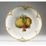 A VERY GOOD SET OF SIX KPM CIRCULAR PLATES edged in gilt, the centres painted with fruit and