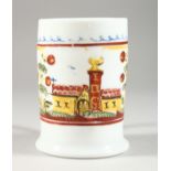 A MILCH GLASS TANKARD painted with buildings. 4.25ins high.