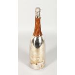 A NOVELTY PLATED AND TURNED WOOD CHAMPAGNE BOTTLE COCKTAIL SHAKER. 14ins high.