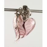 A SILVER AND GLASS HEART SHAPED PENDANT.