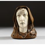 A 19TH-20TH CENTURY EUROPEAN WOOD AND IVORY CARVING, an ivory head with wooden hood. 2.75ins high.