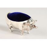 A SILVER PLATED PIG PIN CUSHION. 4.25ins long.