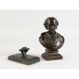 A SMALL BRONZE BUST OF WILLIAM SHAKESPEARE 5ins high and a bronze paperweight (2).