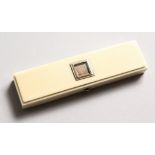 A GEORGE III LONG IVORY TOOTHPICK CASE, the top with square panel, mirror inside with gilt toothpick