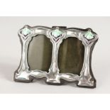 A SMALL ART NOUVEAU STYLE SILVER AND ENAMEL PHOTOGRAPH FRAME. 4.5ins x 3ins.