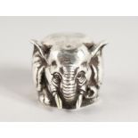 A RUSSIAN SILVER MODEL OF AN ELEPHANT. 2ins long.