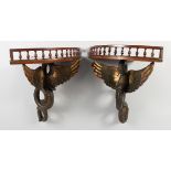 A GOOD UNUSUAL PAIR OF 19TH CENTURY MAHOGANY CORNER WALL SHELVES, the galleried tops supported by