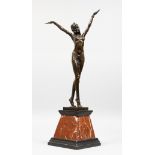 AN ART DECO STYLE BRONZE OF A DANCER on a tapering square marble base. 22ins high.