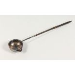 A SILVER TODDY LADLE, with twisted horn handle. 13.5ins long.