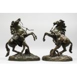 A GOOD PAIR OF 19TH CENTURY FRENCH BRONZE MARLEY HORSES AND ATTENDANTS after COUSTOU. Signed. 15.