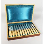 A GOOD CASED SET OF TWELVE FISH KNIVES AND FORKS.