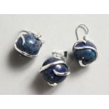 A SILVER AND LAPIS PENDANT with a pair of matching earrings.