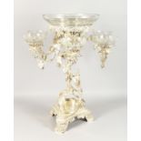 A LARGE AND IMPRESSIVE SILVER PLATED CENTREPIECE of naturalistic form, with a central cut glass bowl