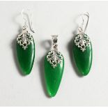 A SILVER AND JADE PENDANT, with a pair of matching earrings.