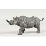 A VIENNA STYLE COLD PAINTED BRONZE OF A RHINO. 6ins long.