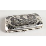 A RUSSIAN SILVER AND NIELLO CHEROOT CASE decorated with a game of "Blind Man's Bluff". 4ins wide.