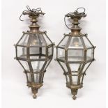 A VERY GOOD PAIR OF CONTINENTAL OCTAGONAL SHAPED BRASS HANGING LANTERNS with bevelled glass