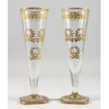 A GOOD PAIR OF BACCARAT FLUTED GLASSES.