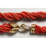 A SUPERB 18K GOLD MULTI STRAND CORAL BEAD NECKLACE.