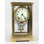 A 19TH CENTURY FRENCH FOUR GLASS CLOCK by Seth Thomas, with pendulum. 10.5ins high.