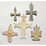 FIVE MEDIUM ROMAN METAL CROSSES.