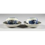 A SALOPIAN BLUE AND WHITE TEA BOWL AND SAUCER and A CAUGHLEY BLUE AND WHITE TEA BOWL AND SAUCER.