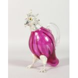 A NOVELTY SMALL CRANBERRY COLOUR GLASS CLARET JUG WITH PLATED MOUNTS, modelled as a parrot. 6.5ind