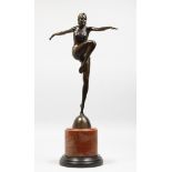 AN ART DECO STYLE BRONZE OF A DANCER on a circular marble base. 22ins high.