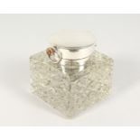 A VERY GOOD CUT GLASS AND SILVER SQUARE INKWELL, the top inset with a large watch, 3.75ins square.