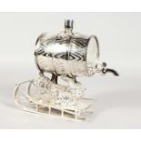 A NOVELTY PLATED LIQUEUR DISPENSER modelled as a bear on a sledge holding up a barrel. 8ins high.