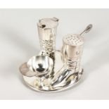 A NOVELTY PLATED RIDING BOOTS AND JOCKEY CAP CRUET. 3.5ins high.