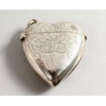 A SILVER HEART SHAPED VESTA.