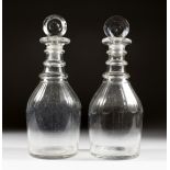 A GOOD PAIR OF GEORGIAN DECANTERS AND STOPPERS.