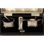 A THREE PIECE SILVER CONDIMENT SET. Birmingham.