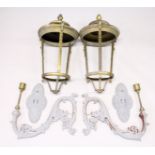 A VERY LARGE PAIR OF HEAVY BRASS TAPERING LANTERNS with pineapple finials (lacking glass panels),