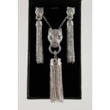 A SILVER CARTIER STYLE PANTHER NECKLACE AND EARRINGS.