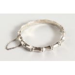 A SILVER BAMBOO DESIGN BRACELET.