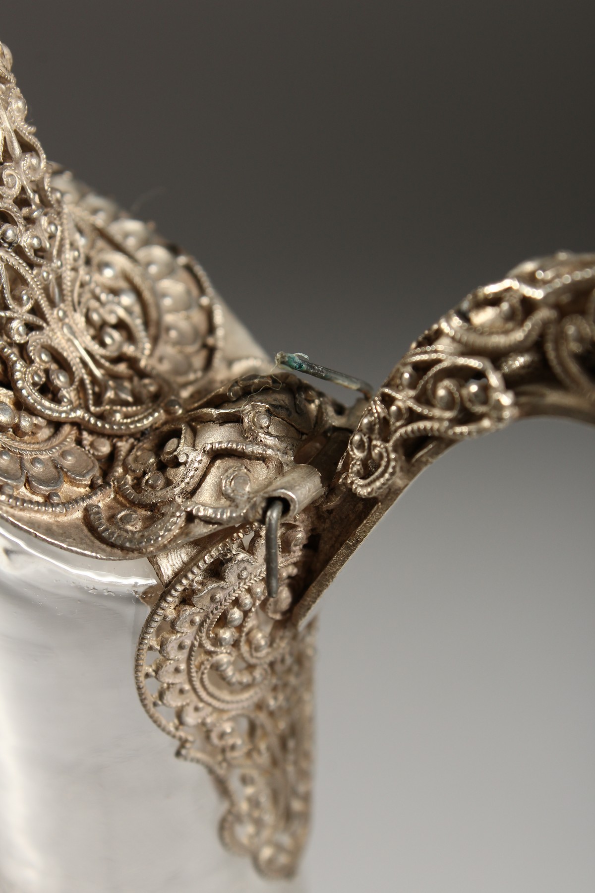 A SUPERB FILIGREE SILVER AND ETCHED GLASS CLARET JUG. 10.5ins high. - Image 5 of 5