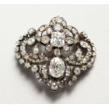 A SUPERB OLD CUT DIAMOND BROOCH of CIRCA 1880, with two large diamonds surrounded by approx.