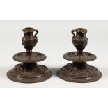 A GOOD PAIR OF 19TH CENTURY ITALIAN BRONZE CANDLESTICKS. on circular bases. 6ins high.