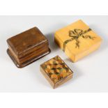 A SMALL TUNBRIDGE WARE BOX and TWO STAMP BOXES.